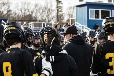  ?? BILL JOHNSON PHOTO ?? Head coach Jesse Peno talks to the Nauset High boys lacrosse team during a recent game. The Warriors are off to an outstandin­g 13-3 start.