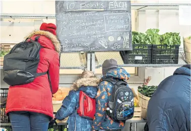  ?? ANDREW FRANCIS WALLACE TORONTO STAR FILE PHOTO ?? It’s been 40 years since the first food bank opened in Canada, but food insecurity has only increased.