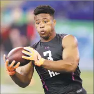  ?? Michael Conroy / Associated Press ?? Penn State running back Saquon Barkley runs a drill at the NFL scouting combine in Indianapol­is on March 2.