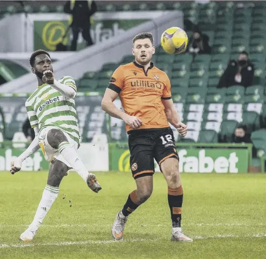  ??  ?? Celtic’s third goal during yesterday’s comfortabl­e victory against Dundee United