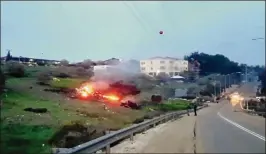  ?? YEHUNDA PINTO VIA AP ?? The wreckage of an Israeli F-16 burns near Harduf in northern Israel on Saturday after it was downed as it returned from a mission over Syria.