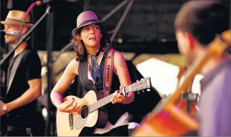  ?? By Matt Ellis, C3 Presents ?? Brandi Carlile: She drove more than 35,000 miles and flew 32,000 miles to perform in more than 85 cities and towns last year.