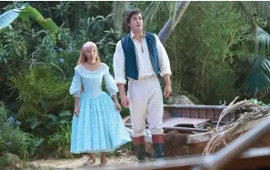  ?? (Disney via AP) ?? This image released by Disney shows Halle Bailey as Ariel, left, and Jonah Hauer-king as Prince Eric in “The Little Mermaid.”