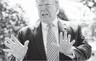  ?? Saul Loeb / AFP / Getty Images ?? President Donald Trump addresses reporters at the White House. “When they agree to (not have nuclear weapons) ... they’re going to be so happy and I’m going to be their best friend,” he said.