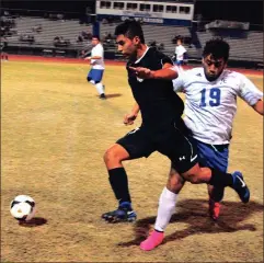 ?? FRANK CROWE / For the Calhoun Times ?? Calhoun’s Johnathan Castillo (left) pushes the ball past a Gordon Central defender during Thursday’s game.