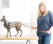  ?? Photo / File ?? Right, Bucknall with her piece Paradise Cat at the 2008 NZ Sculpture OnShore exhibition.