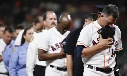  ?? Photograph: Eric Christian Smith/AP ?? AJ Hinch, right, is out of a job after MLB concluded the Astros had stolen signs from opponents.