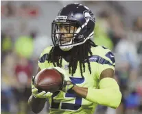  ?? AP PHOTO ?? SHERMAN: CB staying in NFC West but with 49ers.