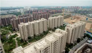  ?? AFP ?? China’s property developers appear unfazed by tighter local government financing. —