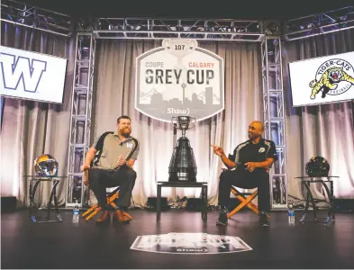  ?? TODD KOROL / THE CANADIAN PRESS FILES ?? Winnipeg Blue Bombers head coach Mike O'Shea, left, and Hamilton Tiger-Cats head coach Orlondo Steinauer
answer questions at last year's Grey Cup Week in Calgary. Who knew there would be no Grey Cup this year?