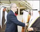  ?? KUNA photo ?? US Ambassador Lawrence R. Silverman shakes hands with His Highness Sheikh Nasser Al-Mohammad Al-Ahmad Al-Sabah who is heading for the US to take part in the funeral of the 41st US President George H. W. Bush.