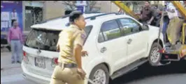  ?? ANI ?? Police towing away YRS Telangana Party chief Y S Sharmila’s car with her inside in Hyderabad on Tuesday.