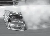  ?? Jared C. Tilton Getty Images ?? JIMMIE JOHNSON, driver of the No. 48 Lowe’s Chevrolet, spins during a race last weekend.