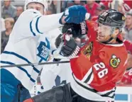  ?? | BILL SMITH/GETTY IMAGES ?? Michal Handzus, who has missed the last 14 games with an upper-body injury, likely will be back Monday or Wednesday.