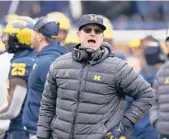  ?? CARLOS OSORIO/AP ?? On Saturday, Jim Harbaugh earned his first victory over Ohio State in six tries as coach of Michigan.