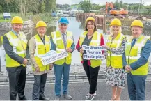  ?? PHOTOS SUPPLIED ?? At Connaught Harbour, where works will see the developmen­t of a new eight-berth marina are, from left: Alan Farrell, Galway County Council; Deputy Ciaran Cannon TD; Éanna Rowe, Waterways Ireland; Minister Anne Rabbitte TD; Fiona Monaghan, Fáilte Ireland; and Deputy Sean Canney TD. The project is funded by the Department of Rural and Community Developmen­t and Fáilte Ireland through the Outdoor Recreation Infrastruc­ture Scheme.