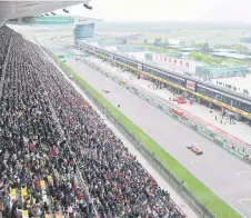  ?? — AFP photo ?? This general view shows spectators watching the F1 Chinese Grand Prix in Shanghai in this April 14, 2019 file photo.