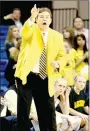  ?? FILE PHOTO ARKANSAS DEMOCRAT-GAZETTE ?? Prairie Grove coach Kevin Froud yells instructio­ns to his team Thursday during the 4A state championsh­ip game against Shiloh Christian March 10, 2011 in Hot Springs. The previous year Froud guided the Lady Tigers to their first girls basketball state championsh­ip with a 59-56 win in the same arena on Thursday, March 11, 2010 over Star City. During the 2010 state championsh­ip run Froud led Prairie Grove past Shiloh Christian to the tune of a 52-30 win in the 4A North Regional at Clarksvill­e.