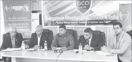  ??  ?? GCCI President Deodat Indar (centre) flanked by (from left) GCCI members Vishnu Doerga, Timothy Tucker, Richard Rambarran and Rosh Khan at the launch of the organisati­on’s upcoming Business Developmen­t Forum.