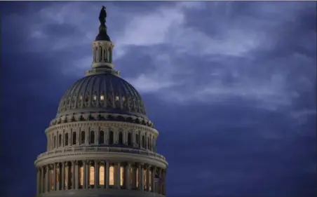  ?? J. SCOTT APPLEWHITE — THE ASSOCIATED PRESS FILE ?? The Capitol Dome is seen at dawn in Washington. The Senate kicked off its annual attempt to pass government funding bills. Success is hardly assured, but President Donald Trump warned Congress he will never sign another foot-tall, $1 trillion-plus...