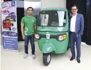  ??  ?? Brian Cu, Head of Grab Philippine­s and Willy Tee Ten, President of Autohub Group