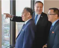  ?? AFPPIX ?? This handout photograph obtained courtesy of the US Department of State shows Yong Chol (left) during his meeting with Pompeo (centre) in New York on Wednesday.