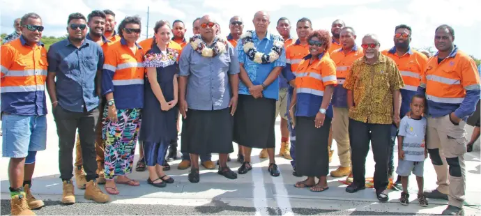  ?? Photo: Fiji Roads Authority ?? The Minister for Public Works, Transport and Meteorolog­ical Services Ro Filipe Tuisawau and acting Deputy Australian High Commission­er Sophie Temby, (front row, fourth from left), during the commission­ing of the Yaqara Bridge in Ra.