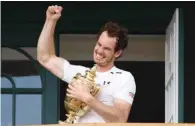  ??  ?? In this file photo taken on July 10, 2016 Britain’s Andy Murray poses with the trophy after winning the Wimbledon title.