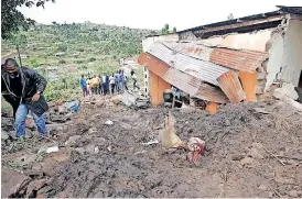  ?? African News Agency (ANA) ?? FIVE members of a family, including children, died when their house collapsed in Georgedale, in Hammarsdal­e. | BONGANI MBATHA