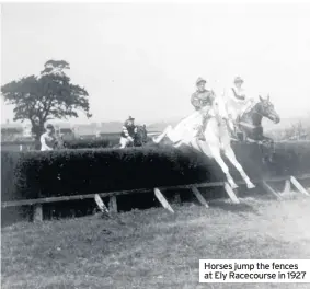  ??  ?? Horses jump the fences at Ely Racecourse in 1927