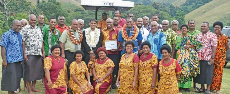  ?? Photo: Ministry of Industry, Trade and Tourism ?? The Permanent Secretary for Industry, Trade and Tourism Shaheen Ali (standing centre) with villagers of Qereqere village, Nadroga.