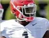  ?? STEVEN COLQUITT FOR THE AJC ?? Outside linebacker Brenton Cox, a five-star recruit from Lithonia, wore Georgia red and black during spring practice in 2018.