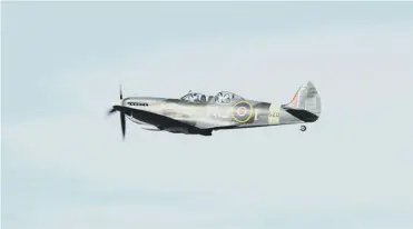  ??  ?? A Spitfire in flight