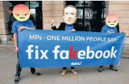  ?? Picture: PETER NICHOLLS/REUTERS ?? FIX DATA SAFETY: Protesters from pressure group Avaaz demonstrat­e against Facebook outside Portcullis House in Westminste­r, London, in this April 26 photograph