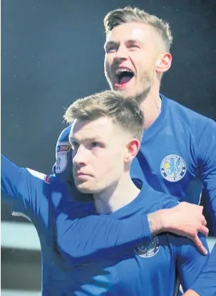  ?? Peter Hilton Photograph­y ?? Joe Ironside celebrates the equalising goal from the spot in the 91st minute