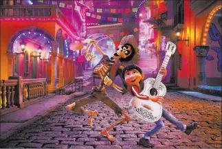  ??  ?? Hector (voiced by Gael Garcia Bernal), left, and Miguel (Anthony Gonzalez) in “Coco.” Disney-pixar