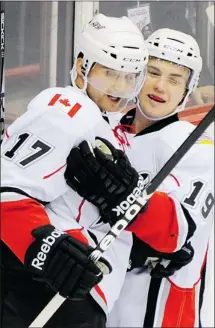  ?? Gerry Kahrmann / Postmedia News ?? Abbotsford Heat #17 Ben Walter, left, celebrates his goal against the Peoria Riverman with teammate #19 Dustin Sylvester. Walter said his team is still feeling very confident, despite recent losses.