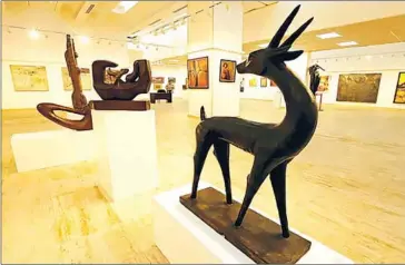  ?? AFP ?? A wooden sculpture of a gazelle with undulating curves is on display at Iraq’s Ministry of Culture.