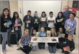  ?? Courtesy photo ?? Tesoro del Valle Elementary School’s student council packs cookies to distribute to first responders as part of a community service project last week.