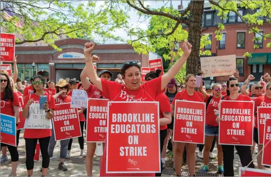  ?? AMANDA SABGA PHOTOS / BOSTON HERALD ?? ENOUGH: Brookline teachers and members of the Brookline Educators Union cheer as they continue their strike and host a rally in front of Town