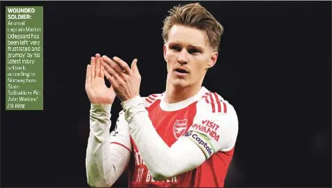  ?? Pic: John Walton/ PA Wire ?? WOUNDED SOLDIER: Arsenal captain Martin Odegaard has been left ‘very frustrated and grumpy’ by his latest injury setback, according to Norway boss Stale Solbakken