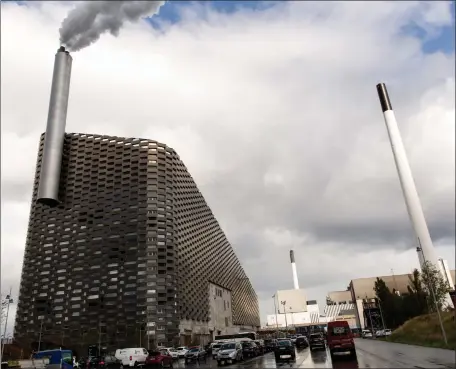  ?? Picture: Getty ?? Amager Bakke incinerati­on plant in Copenhagen, Denmark, whose roof is a ski slope, produces district heating for the city