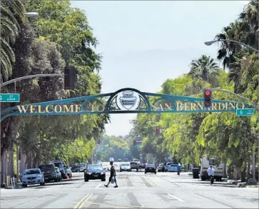  ?? Irfan Khan Los Angeles Times ?? SAN BERNARDINO has emerged from five years of bankruptcy and now will begin paying its creditors. The city still faces a long road ahead, but officials are hoping outsiders will see its potential rather than its troubles.