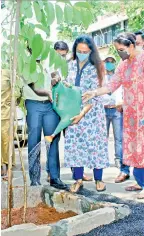  ??  ?? Hema Malini at the tree plantation site during the event