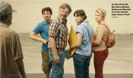  ?? IFC FILMS ?? Jon Bass (from left), Marc Maron, Michaela Watkins and Jillian Bell star in the character study “Sword of Trust.”