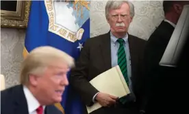  ??  ?? Former national security adviser John Bolton with President Trump at a Nato meeting in the White House in May 2018. Photograph: Saul Loeb/Getty