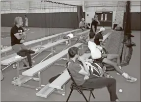  ?? Doug Walker ?? Players and visitors watch action Thursday in the CTR tennis tournament, the first sanctioned event in Rome’s new indoor tennis center.