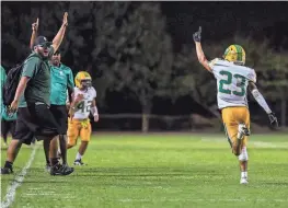  ?? ?? Coachella Valley's Aaron Ramirez (23) celebrates a touchdown during the second quarter of a game at Palo Verde High School in Blythe on Aug. 25.