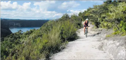  ?? Photo / File ?? Mountain biking the Great Lake Trail.