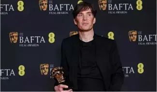  ?? ?? Cillian Murphy, winner of the leading actor award for 'Oppenheime­r', poses for photograph­ers at the 77th British Academy Film Awards, BAFTA's, in London, 18 February 2024